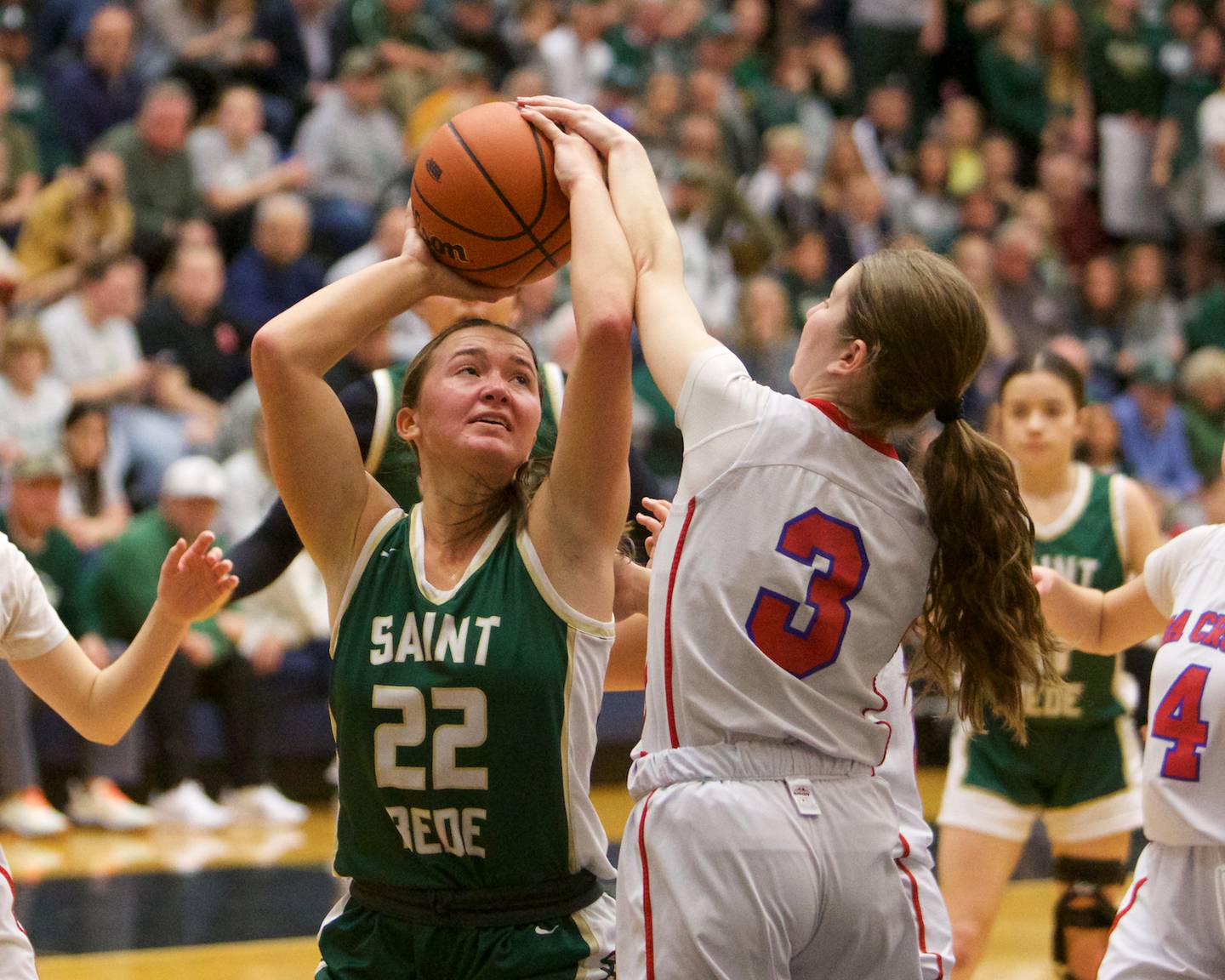 St. Bede's Ella Hermes shoot is blocked by Ida Crown's Llana Schwartz at the Class 1A Girl's Basketball  Super Sectional on Monday , Feb.26, 2024 at Harvest Christian Academy  in Elgin.