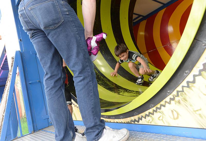 Oliver O'Malley of Brookfield makes his way through the Wacky Shack during the LaGrange Endless SummerFest Sunday Aug 6, 2023.