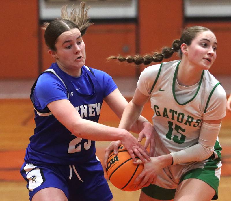 Crystal Lake South’s Tessa Melhuish, right, looks for an option as Geneva’s Nora Hatton looks for the ball in girls IHSA Class 3A Sectional Championship basketball on Thursday, Feb. 26, 2026, at Crystal Lake Central High School in Crystal Lake.