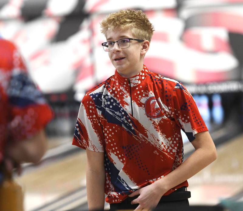 Oregon's Andrew Stahl smiles after throwing a strike during a match with Harvard at Town & Country Lanes in Mt. Morris on Friday, Dec. 19, 2025.