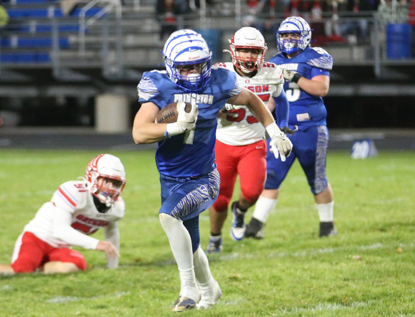 Princeton's Casey Etheridge runs down the field against Oregon during the first round of the Class 3A playoffs on Friday, Nov. 1, 2024 at Princeton High School.