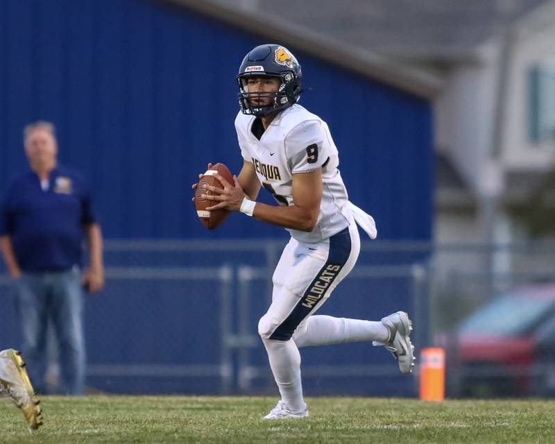 Neuqua Valley's Kiet Truong (9) looks for a receiver while rolling out during a football game between Neuqua Valley and Oswego on Friday, Aug. 30, 2024 in Oswego. Gary E Duncan Sr for Shaw Local News Network.
