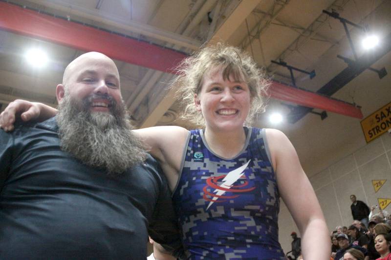 South Elgin’s Allison Garbacz is all smiles after defeating Hinsdale South’s Callie Carr at 155 pounds in varsity girls IHSA Sectional wrestling on Saturday, February 14, 2026, at Schaumburg High School in Schaumburg.