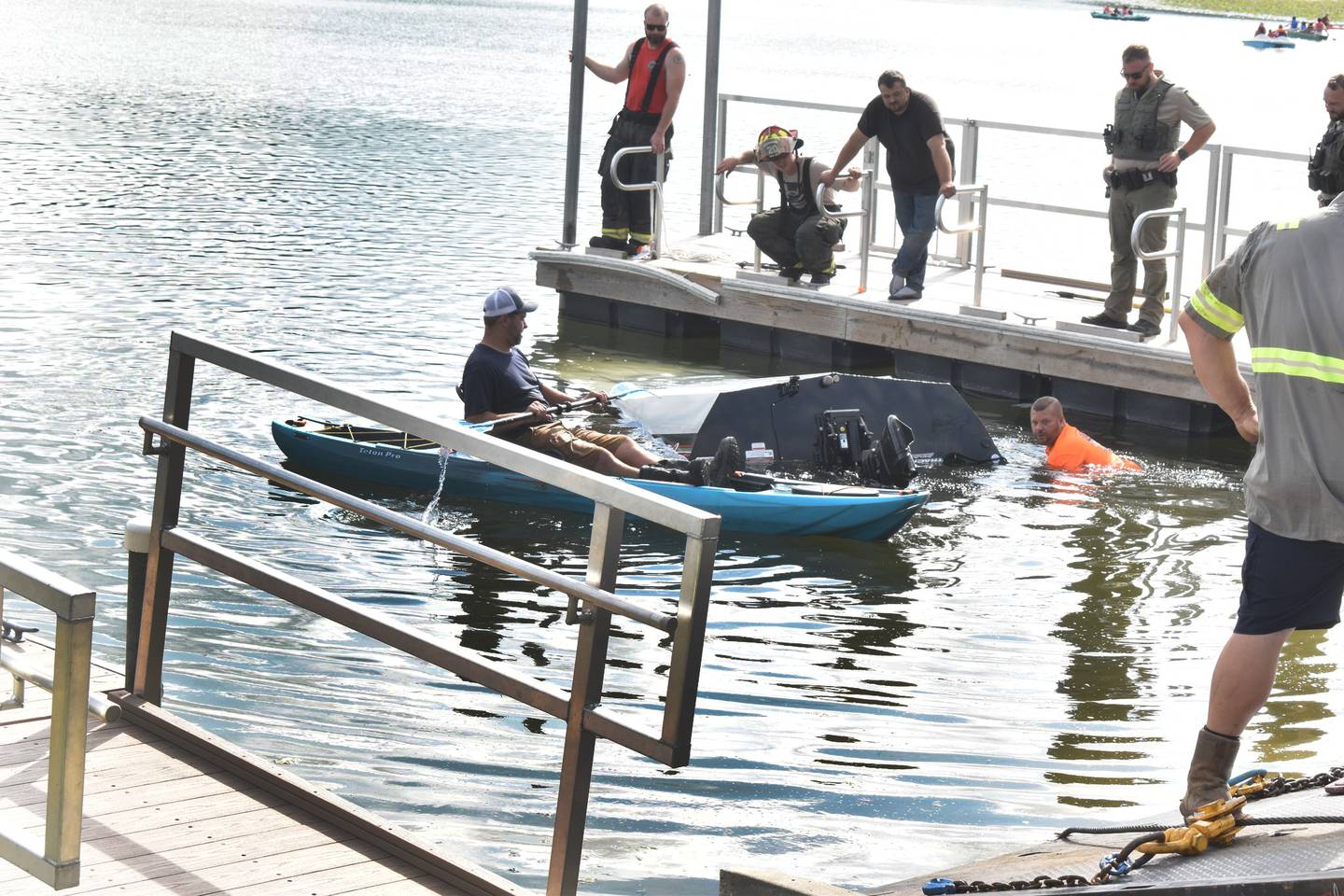 Morrison firefighters work to pull a truck, boat and trailer from the lake at Morrison Rockwood State Park near Morrison on Friday, July 18, 2025. No one was injured after the truck accidentally entered the lake at the boat ramp.