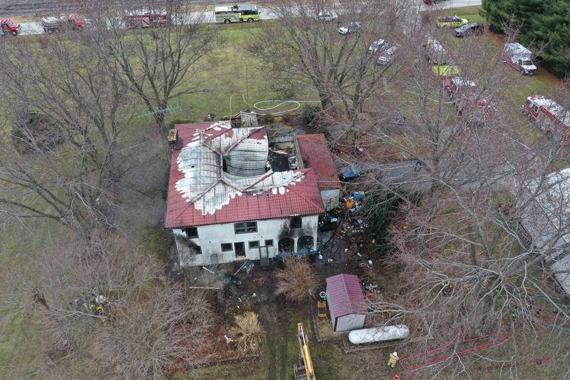 Firefighters respond to a structure fire on North 43rd road about a half mile west of the East 1st road intersection on Thursday, Jan. 2, 2024 in Mendota.