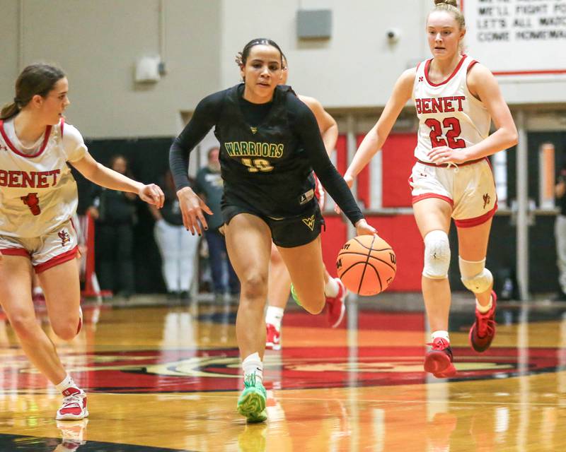Waubonsie Valley's Danyella Mporokoso (10) races down the court during their Class 4A Bolingbrook Sectional final basketball game between Waubonsie Valley at Benet. Feb 27, 2025 in Bolingbrook.