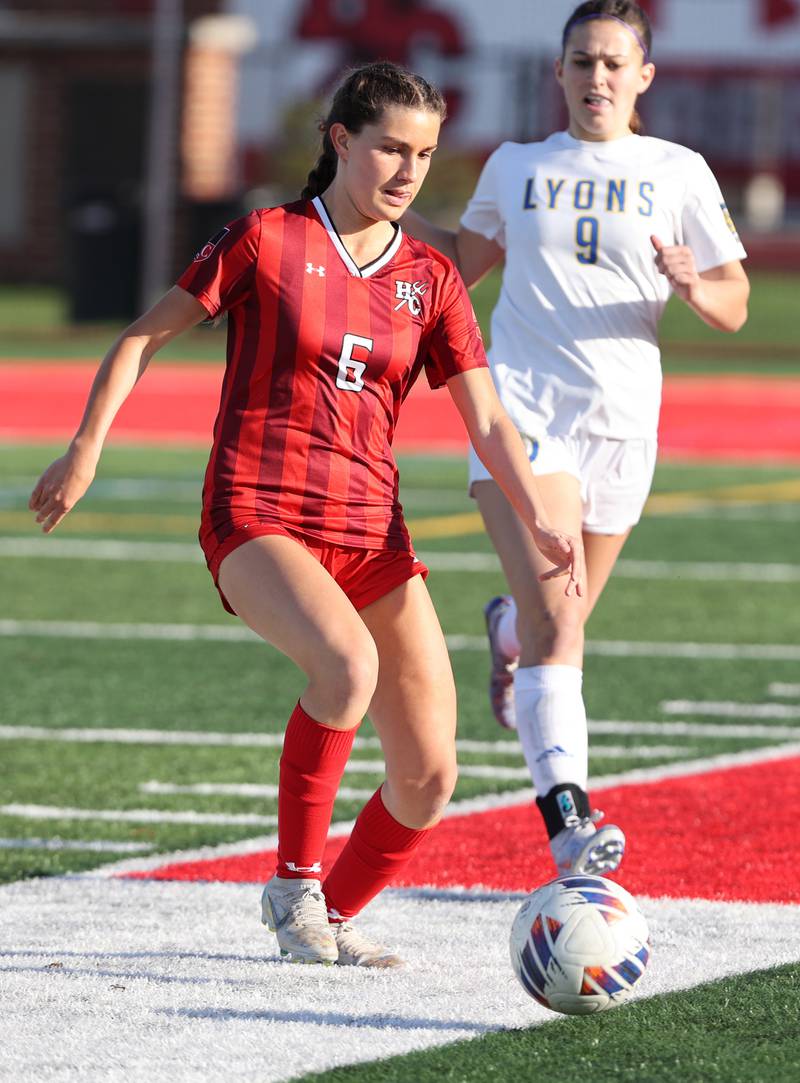 Hinsdale Central's Julia Marinaccio (6) goes for the ball during the girls varsity soccer match between Lyons Township and Hinsdale Central high schools in Hinsdale on Tuesday, April 18, 2023.
