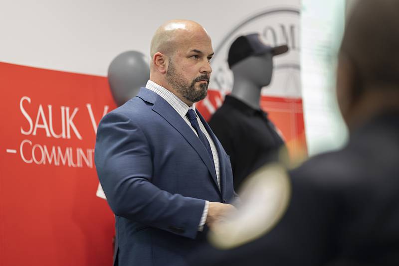 Sauk Valley College police academy director Jason Lamendola speaks to a group of police officials Tuesday, Dec. 13, 2022 during an open house of the new academy.