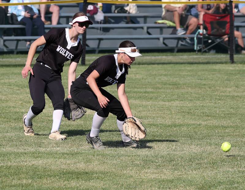 Prairie Ridge's Autumn Ledgerwood makes a play in left field as teammate Kylie Carroll backs her up Friday, June 6, 2025, during their Class 3A sectional final game against Crystal Lake Central at Sycamore High School.