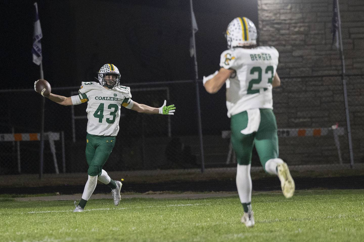 Coal City’s Gaven Vestal celebrates a long TD catch against Dixon Friday, Nov. 7, 2025.