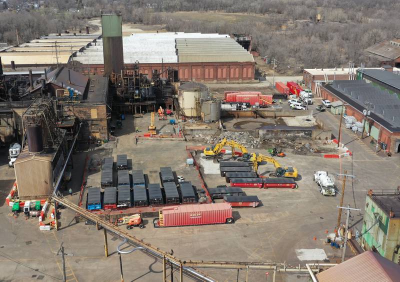 Dozens of garbage dumpsters remain at the site along with excavators as crews continue to clean the area of destruction from the chemical fire three-months later at Carus Chemical on Tuesday, April 11, 2023 in La Salle.