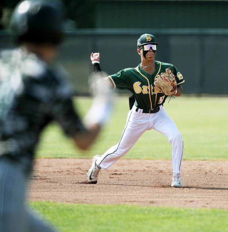Crystal Lake South’s Edgar Camacho II  throws out Grayslake Central’s Riley Policht in a 3A sectional semifinal baseball game in Grayslake on Thursday, June 1, 2023.