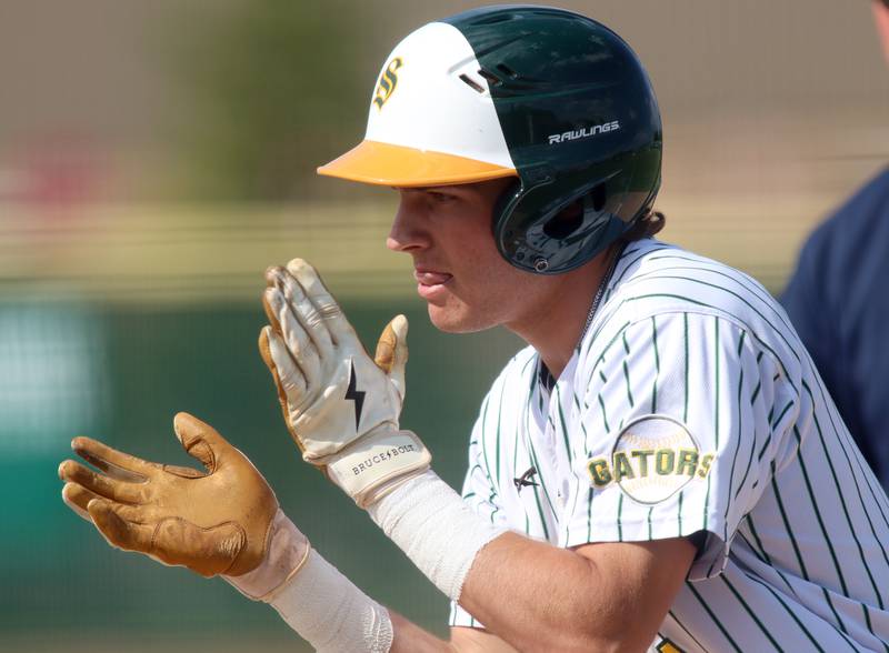 Crystal Lake South’s Dayton Murphy celebrates after legging out a single against Lake Forest in Class 3A baseball regional action at Crystal Lake Thursday.