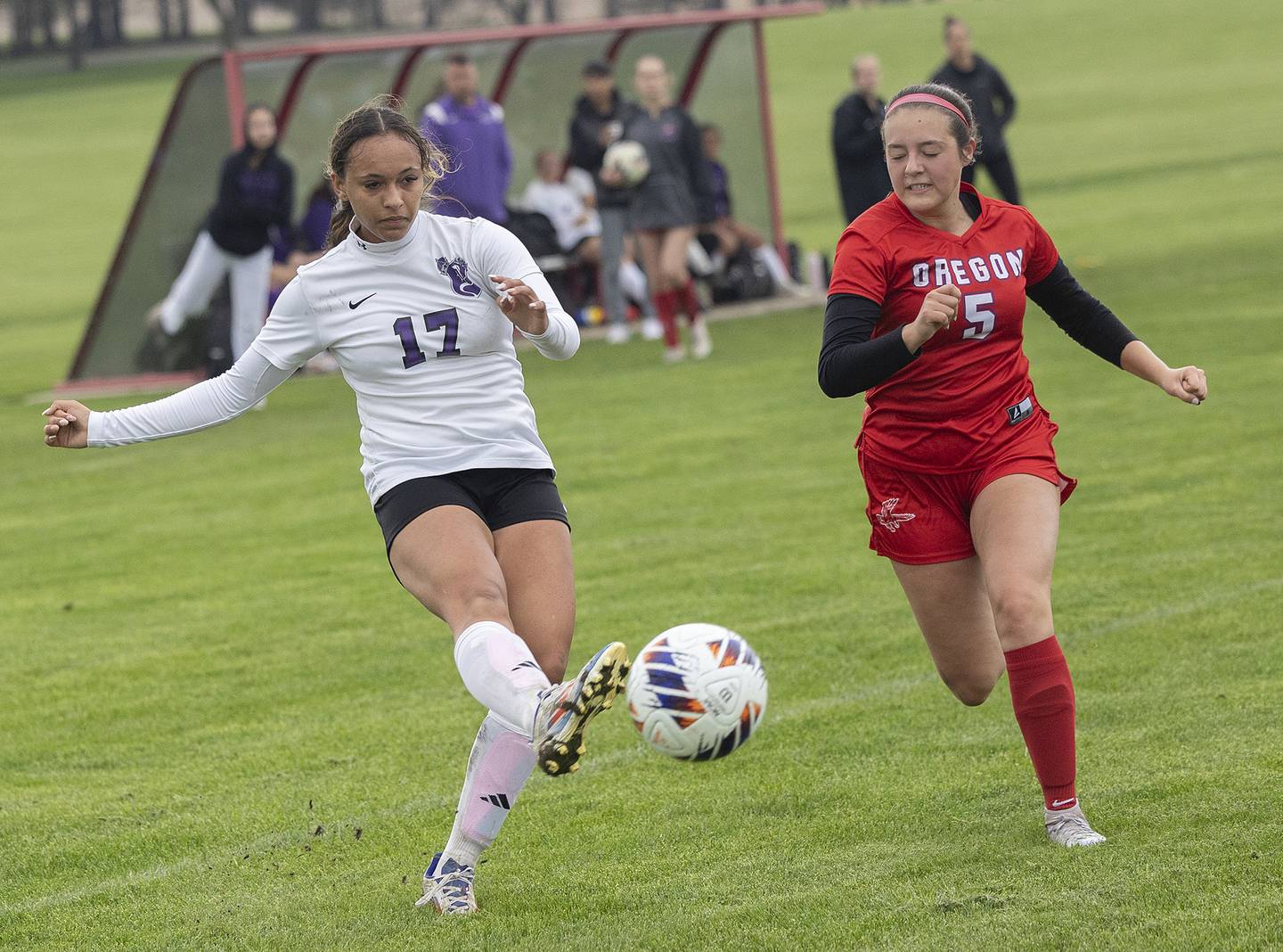 Dixon’s Kamille Prather kicks the ball against Oregon’s Ava Carenno Thursday, May 1, 2025.