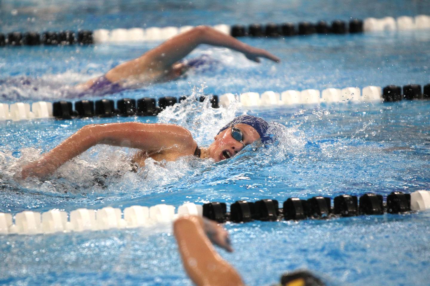 Oswego's Corinne Guist swims the 500-yard freestyle during the IHSA State Swimming Championship preliminaries at FMC Natatorium in Westmont on Friday, Nov. 12, 2021.