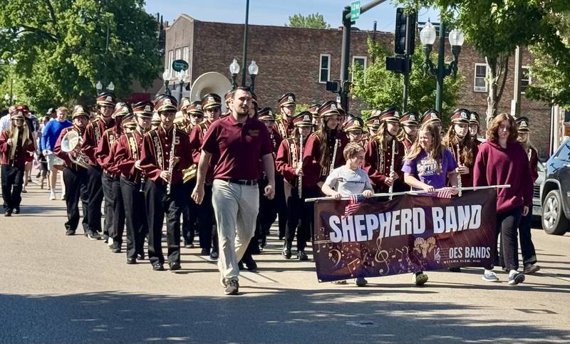 Sheppard Middle School's band marches down the street during Ottawa's Memorial Day parade Monday, May 25.