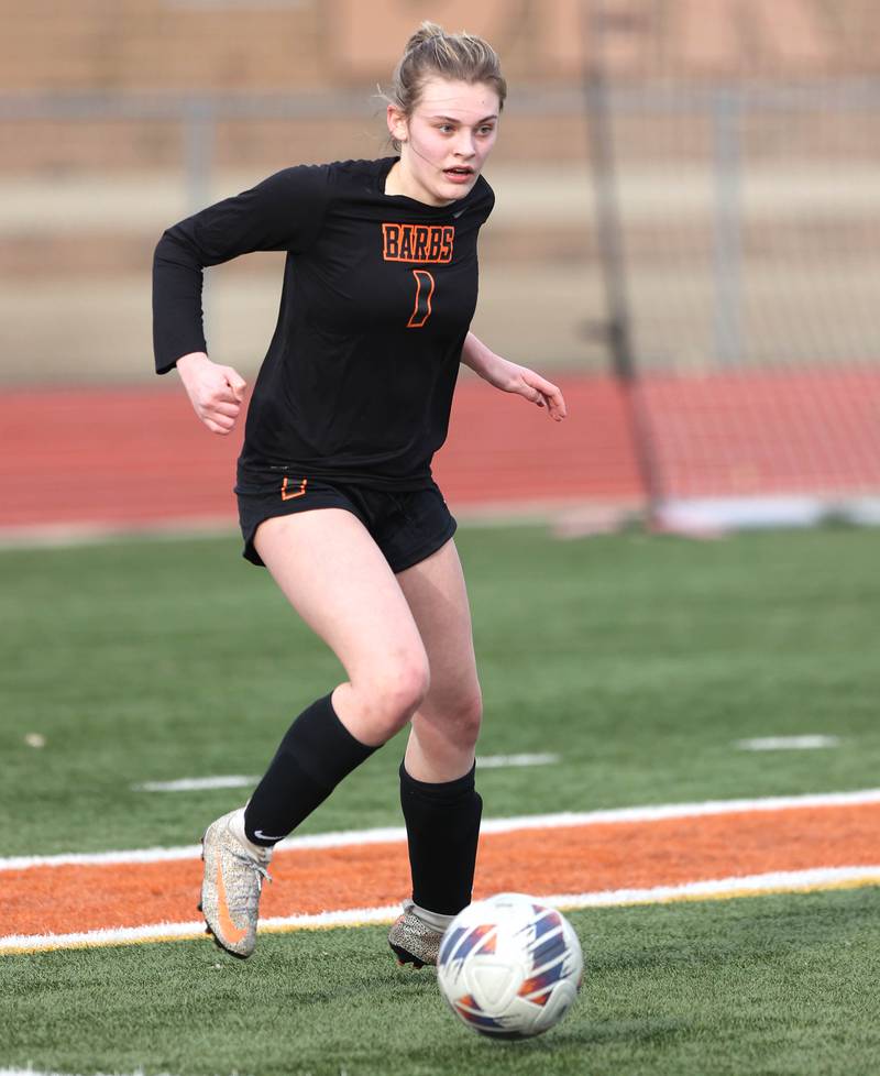 DeKalb’s Hannah Safford looks to clear the ball from their end during the game against Belvedere North Wednesday, March 15, 2023, at DeKalb High School.