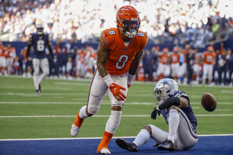 Chicago Bears' N'Keal Harry celebrates his touchdown catch in front of Dallas Cowboys' Kelvin Joseph during the first half, Sunday, Oct. 30, 2022, in Arlington, Texas.