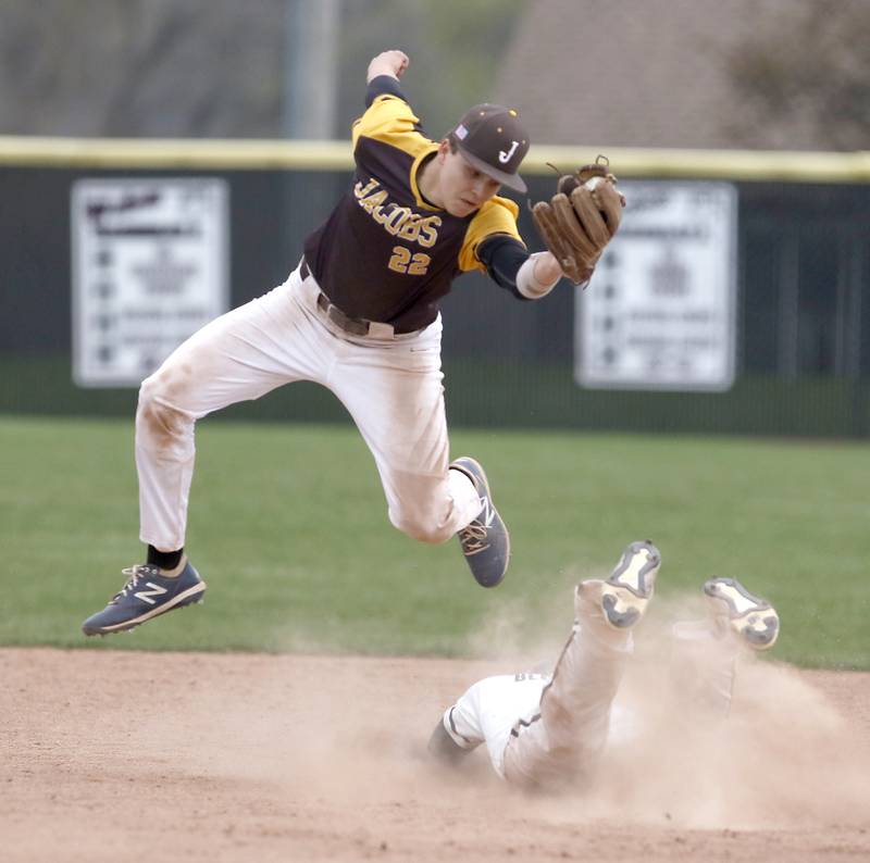 Jacobs’s Quinn Butera catches the ball as Prairie Ridge's Zachary Bentsen slides into second base during a Fox Valley Conference baseball game Friday, April 29, 2022, between Prairie Ridge and Jacobs at Prairie Ridge High School.