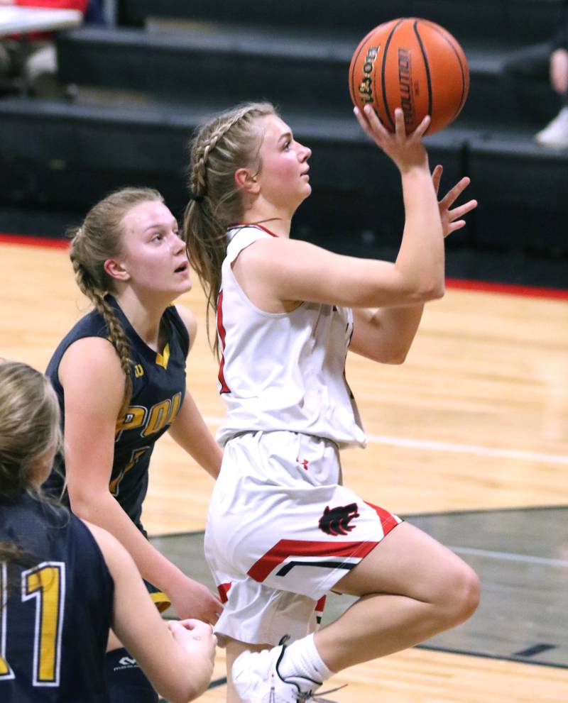 Indian Creek's Madison Bogle shoots a floater in the land in front of Polo's Kadence Sheaffer during their Class 1A regional game Tuesday, Feb. 15, 2022, at Indian Creek High School in Shabbona.
