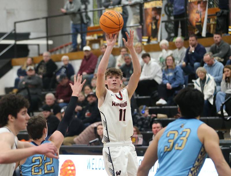Woodland's Nate Berry shoots a wide-open jump shot against Marquette during the Tri-County Conference Tournament championship on Friday, Jan. 30, 2026 at Putnam County High School.