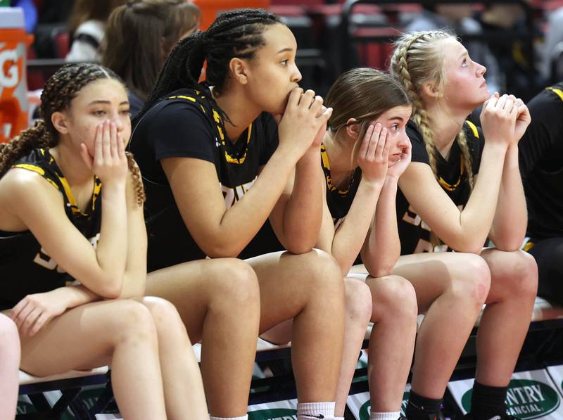 The Hinsdale South bench watches the seconds tick off in their loss to Glenwood during their game Friday, March 1, 2024, in the IHSA Class 3A state semifinal at the CEFCU Arena at Illinois State University in Normal.