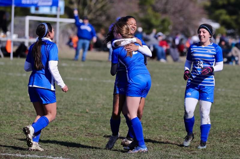 Mariah Hobson and the Tigresses celebrate a goal against Streator in Saturday's third-place game of the Princeton Invitational.