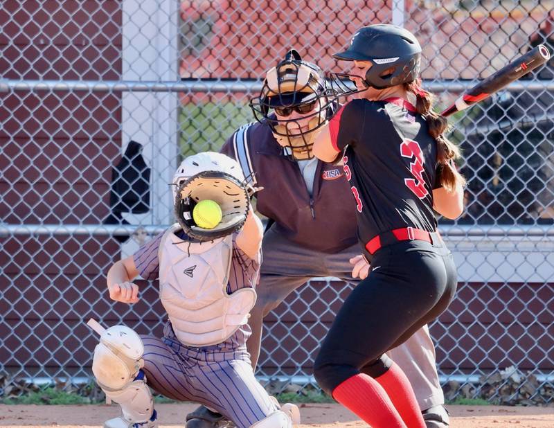 Hall senior Kennedy Wozniak takes a pitch Thursday against Princeton. PHS won 12-2.