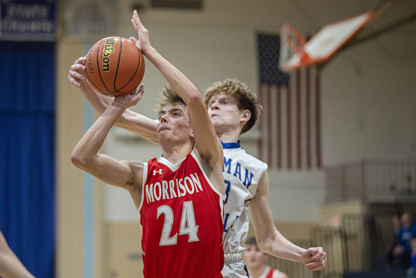 Morrison’s Mason Dykstra has his shot blocked by Newman’s Lucas Simpson on Monday, Feb. 14, 2022.