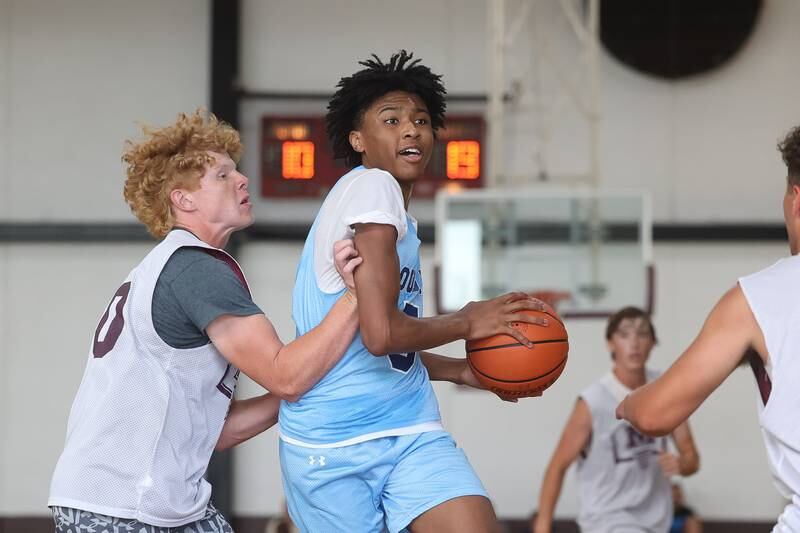 Plainfield South’s Kareem Parker makes a move to the basket against Morris at the 37th Morris Boys Shootout on Tuesday, June 25, 2024.