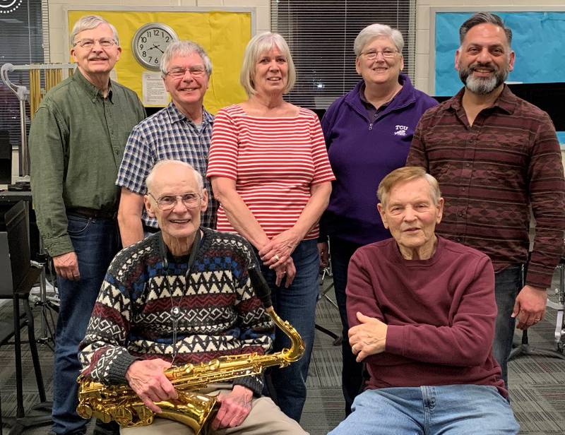 Kishwaukee Concert Band members: (seated) Rich Carlson and Lowell May, (standing) Larry Apperson, Dave Lehman, Elli McLaughlin, Deb Shofner, and Jay Monteiro. Members not pictured: Aaron Butler and Jerry Zar