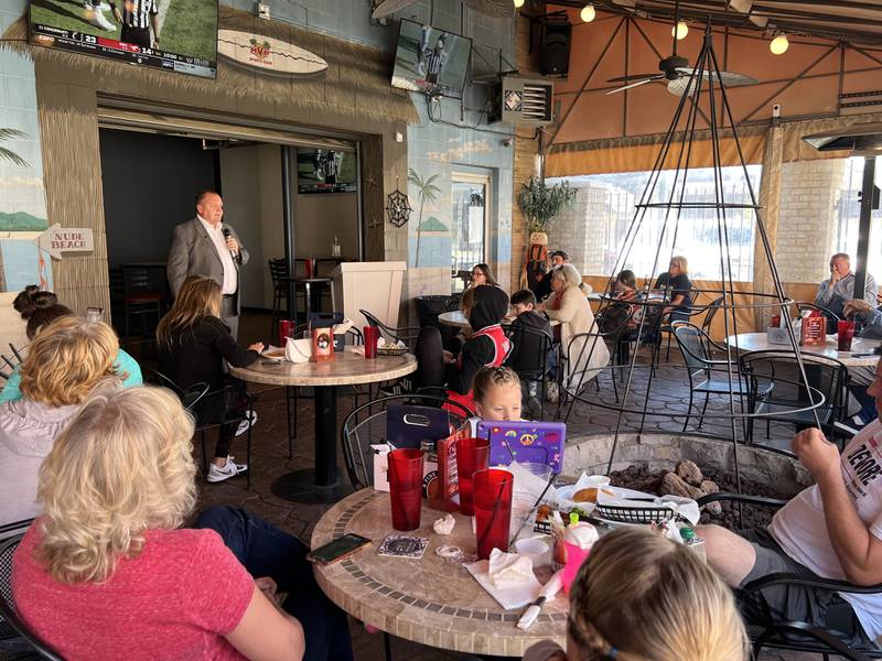 A crowd of less than two dozen filled the beer garden at the MVP Sports Bar in Sycamore on Oct. 22, 2022 to hear what Thomas DeVore had to say about the SAFE-T Act.