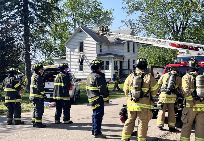 Firefighters work the scene of a house fire in the 800 block of North Mercer Street on Wednesday, April 22, 2026 in Princeton.