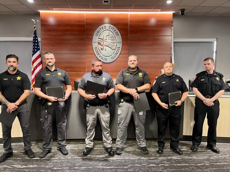 Distinguished Service Awards were presented to the members of the investigations unit by Yorkville Police Chief James Jensen. Those awarded include Detective Jeff Johnson, Detective Matt Ketchmark, School Resource Officer Ryan Goldsmith, Detective Sergeant Matt Nelson and Deputy Chief Ray Mikolasek.