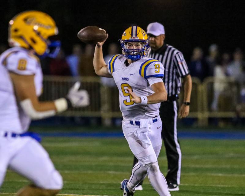 Lyon's Ryan Jackson (9) looks to throw a pass to Luke Wehling (8) during football game between Hinsdale Central at Lyons.  Sept 8, 2023.