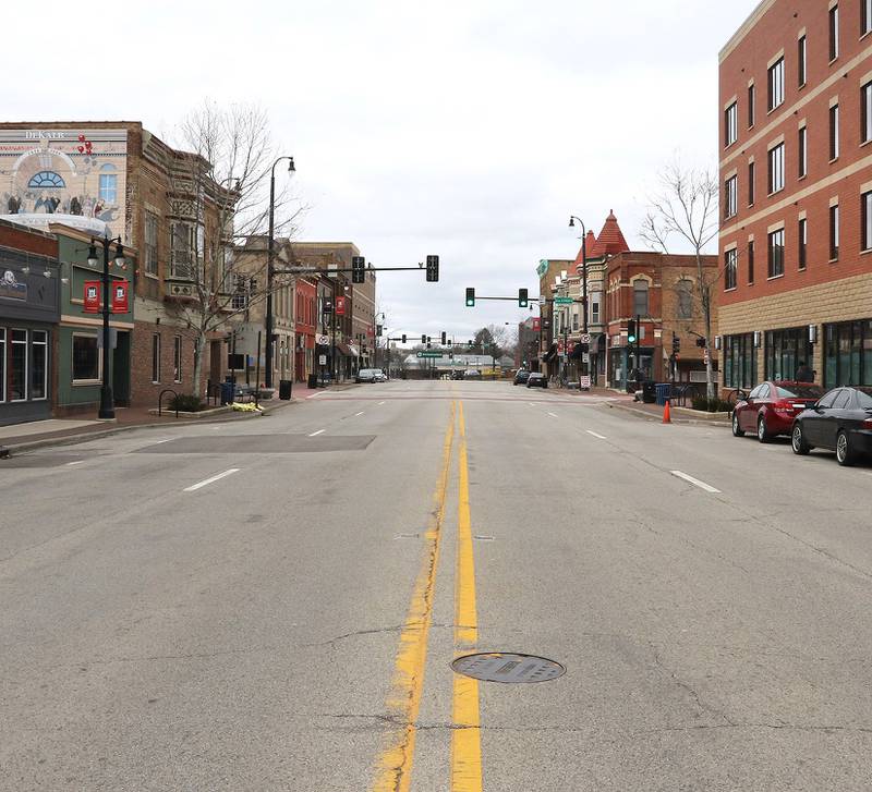 Downtown DeKalb is empty Friday as many businesses have sent their employees home and less people are venturing out due to the coronavirus crisis. The streets will be even more void of traffic beginning Saturday night as Illinois Gov. J.B. Pritzker announced a "shelter-in-place" order for the state, starting at 5 p.m. Saturday through April 7.