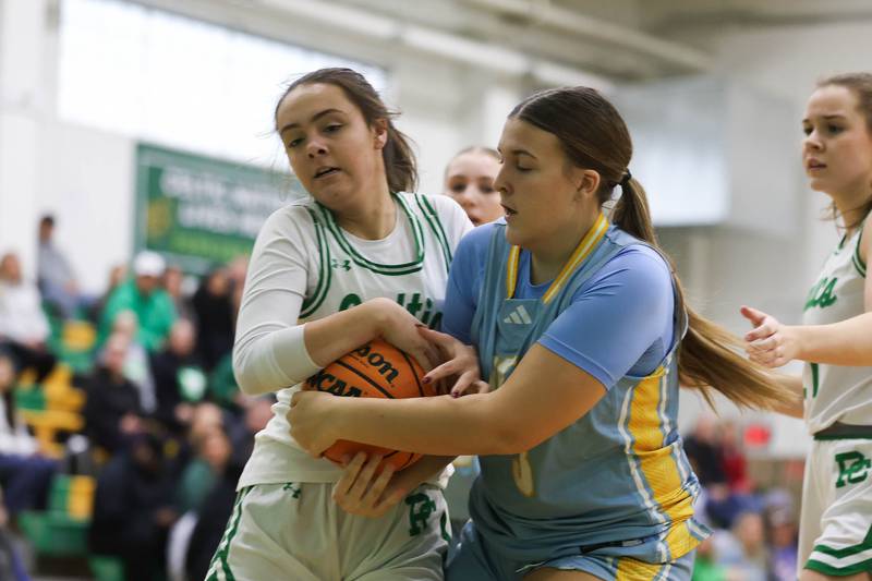 Providence’s Liv Anderson and Joliet Catholic’s Lindsey Blabas battle for the ball on Saturday, Dec. 5, 2025 in New Lenox.
