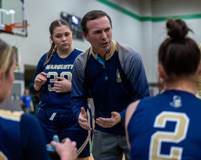 Marquette Head Coach, Eric Price talks to team during time out on Monday, November 17, 2025 at Seneca High School in Seneca.
