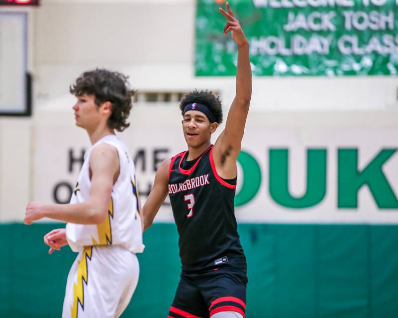 Bolingbrook's Davion Thompson (3) gestures after hitting a three during their Jack Tosh Holiday Classic basketball tournament game between Bolingbrook at Glenbrook South. Friday Dec 27, 2024 in Elmhurst.