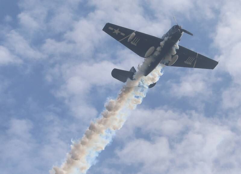 A World War II TBM Torpedo Bomber flys during the 16th annual Utica Veterans Parade and Air Show on Sunday Nov. 5, 2023 downtown Utica.