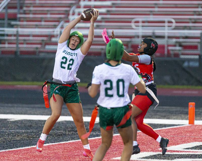 \Plainfield Central's Sylvia Magemeneas (22) goes for the interception during flag football game between Plainfield Central at Bolingbrook Wednesday, Sept 3, 2025  in Bolingbrook.