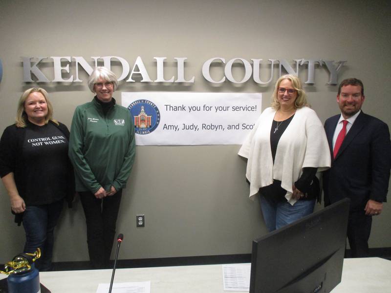 Four members of the Kendall County Board served their last meeting on Nov. 29, 2022. They are, from left, Amy Cesich, Judy Gilmour, Robyn Vickers and Scott Gryder.