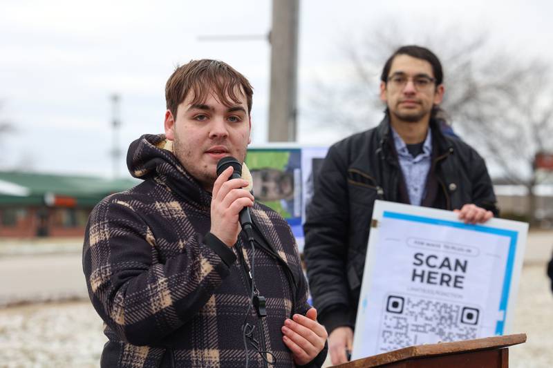 Dominic Compton, of Bourbonnais, speaks to the crowd of about 100 gathered for an ICE Out for Good protest and vigil at The Grow Center in Bourbonnais on Sunday, Jan. 11, 2026.