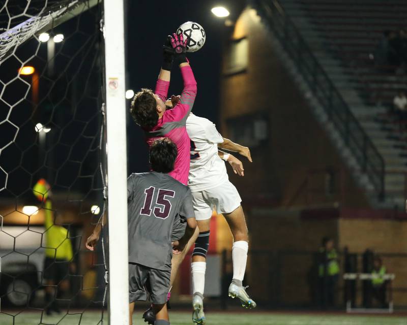 Morton's Diego Vargas (1) makes a save during soccer match between Naperville North at Morton.  Sept 21, 2023.