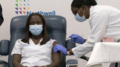 'Relieved': U.S. health workers start getting COVID-19 vaccine