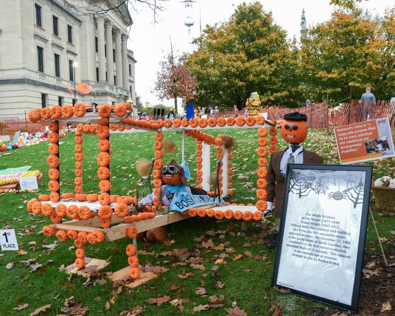 Bosma Dental took first in the Organization or group adult category with their Wright brother pumpkin display with working propellers during the Sycamore Pumpkin Festival held at the Sycamore courthouse lawn on Friday Oct. 27, 2023.