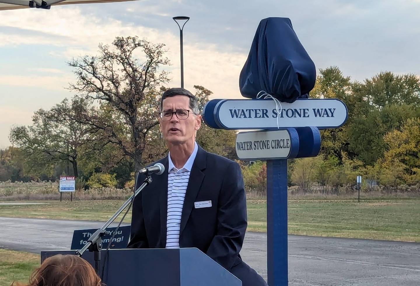 Lightways chaplain Jim McGuire speaks at Lightways Hospice and Serious Illness Care in Joliet for the dedication of Honorary Duane Krieger Drive on Tuesday, October 22, 2024.