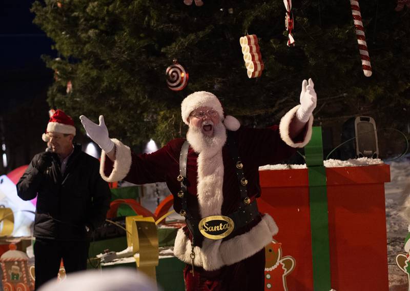 Santa Claus arrives to help light the Christmas Tree outside the Kankakee Train Depot on Thursday, December 4, 2025.