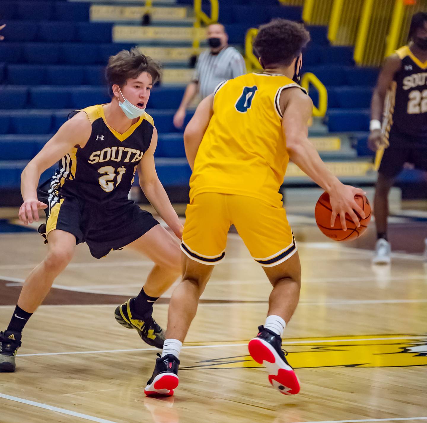 Hinsdale South's Brendan Savage (left) defends Sterling's Andre Klaver during their Sterling MLK tournament game Saturday evening at Musgrove Fieldhouse.