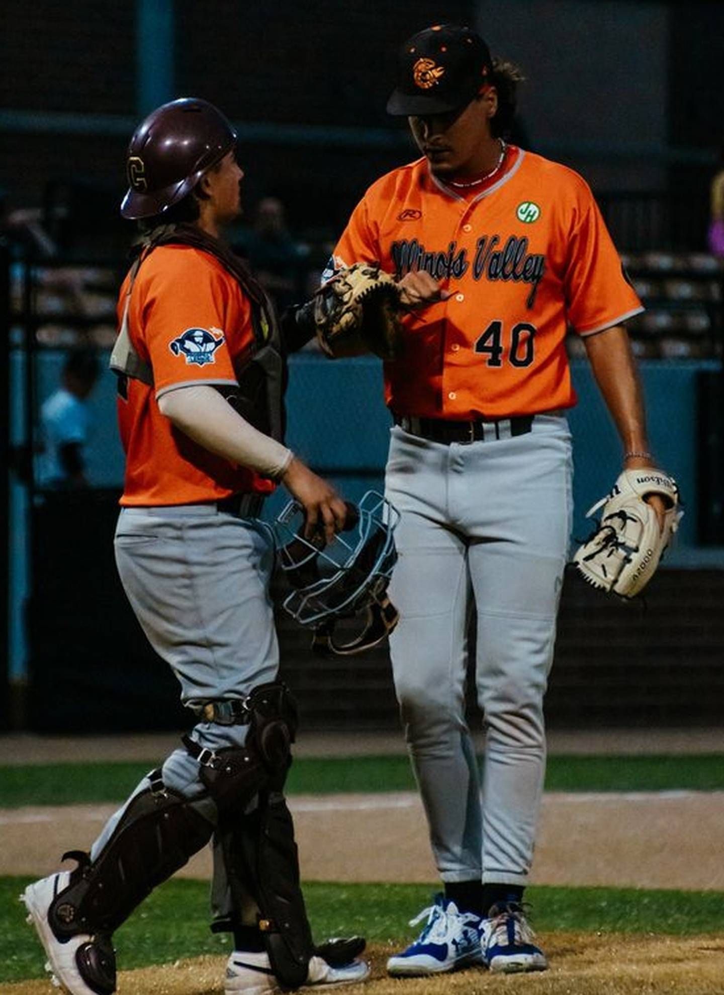 Catcher Brandon Mahler (left) talks to Kyler Miritello during the Illinois Valley Pistol Shrimp's 2-1 win over the Lafayette Aviators on Tuesday, July 16, 2024 in Lafayette, Ind.